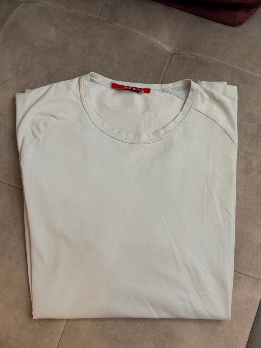 Prada Men's White Crewneck Tee with Red Neck Tag